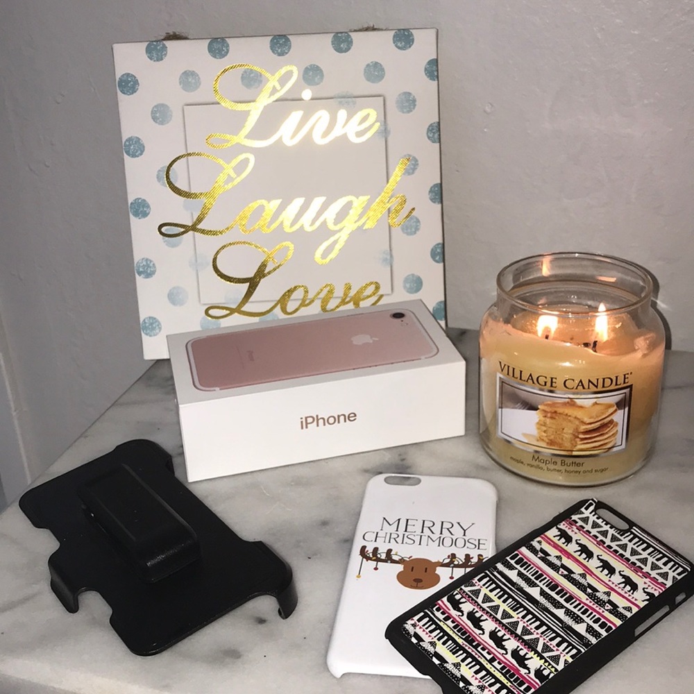 IPhone 7 box with 2 cases and otter box holder